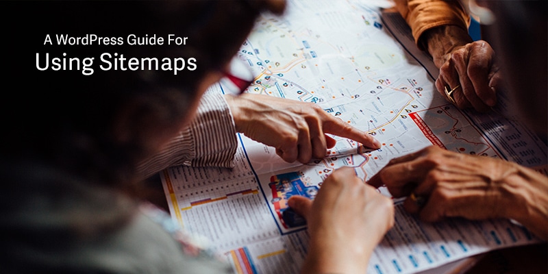 A WordPress Guide For Using Sitemaps. Closeup Of People's Hands Pointing At Locations In A Map
