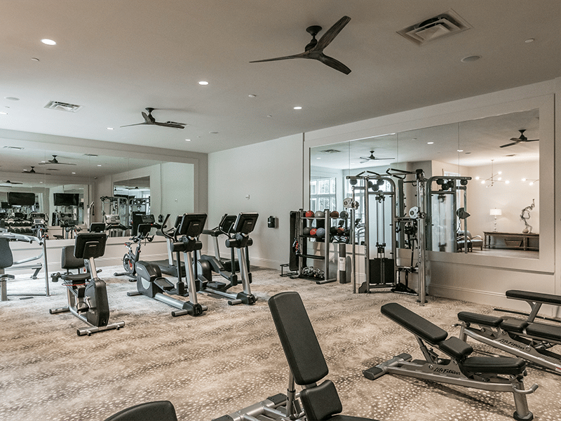 Gym In Harpeth Square Apartments. It Has Multiple Set Of Weights, TVs, Elliptical Machines.