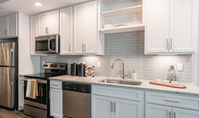 White, Elegant Kitchen In One Of Harpeth Square Apartments