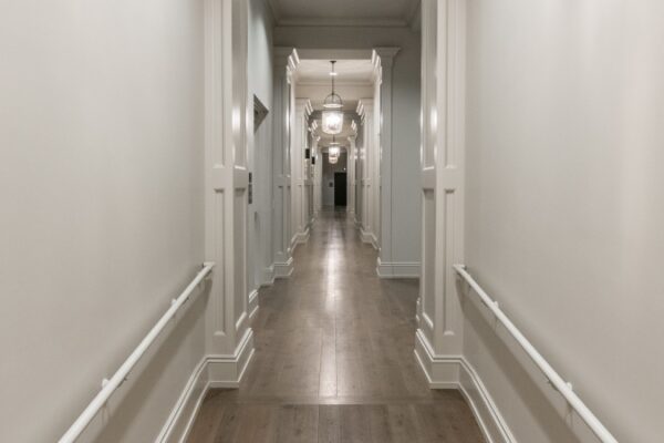 Hallway In Harpeth Square Apartments. White Walls, Lights, And Looks Clean And Elegant.